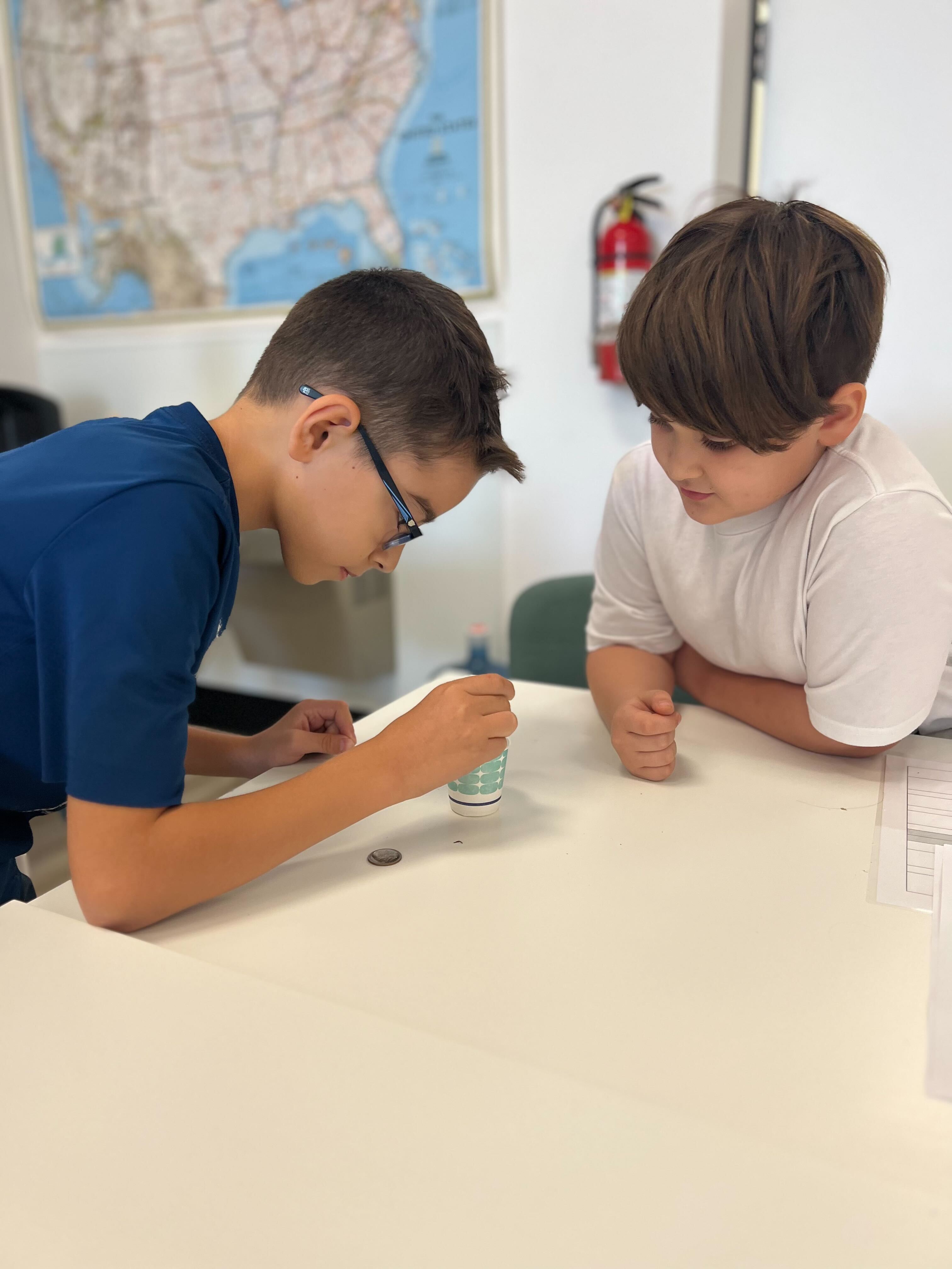 two boys learning together at a micro school