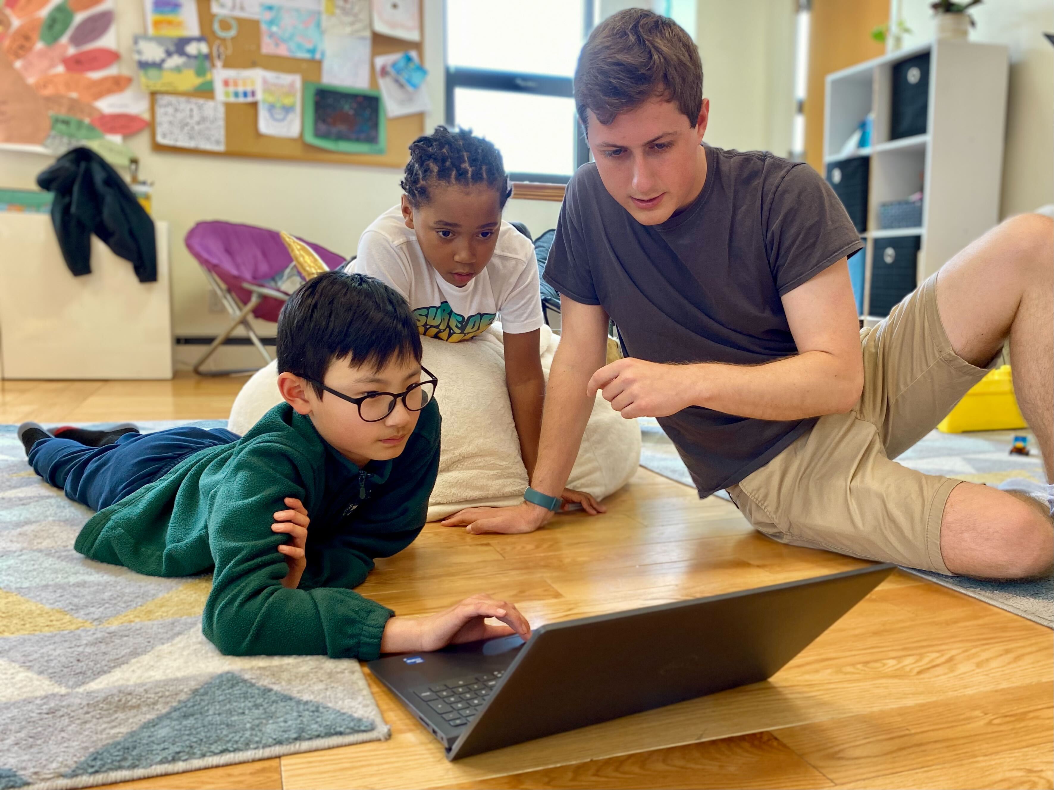 kids on laptop at microschool